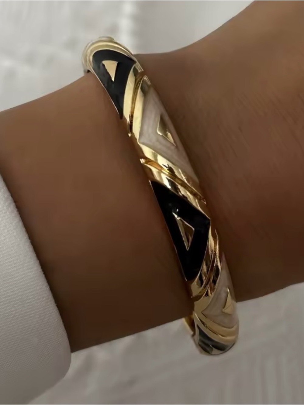 Gold-Tone Black and Cream Enamel Hinged Bangle Bracelet